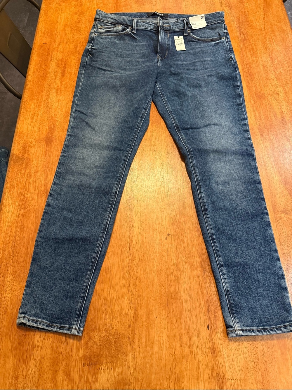 EXPRESS NWT Women’s mid rise 12R